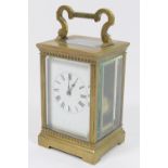 French brass carriage clock, circa 1900-20, white enamelled dial with Roman numerals, the movement