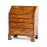 George III mahogany bureau, circa 1780, with later restorations, of small proportions, fitted
