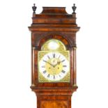 George II walnut longcase clock by William Winrow, London, circa 1730, the hood having a stepped