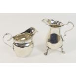 Silver baluster cream jug, Sheffield 1900, 10cm; also a silver helmet shaped cream jug, Birmingham
