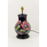 Moorcroft Anemone table lamp, blue ground, original fitments (no shade), height 34cm