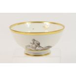 Paris porcelain bowl, early 19th Century, decorated en grisaille with a figure playing boulles