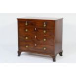 Late Regency mahogany chest of drawers, circa 1830, fitted with two short and three long graduated