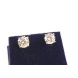 Good pair of diamond ear studs, each having a round brilliant cut stone of approx. 1.45cts,