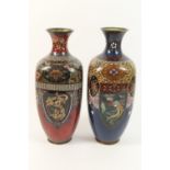 Two Chinese cloisonne vases, of similar design, each of ovoid square section decorated with panels