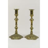 Pair of Georgian brass bi-sectional candlesticks, height 24.5cm