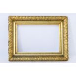 Carved giltwood picture frame, late 19th/early 20th Century, interior size 76.5cm x 52cm