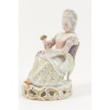 Meissen porcelain figure, modelled as a young lady seated in a chair and holding a rose, late 19th