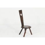 Good Welsh carved walnut spinning chair, late 19th Century, having a traditional guilloche carved