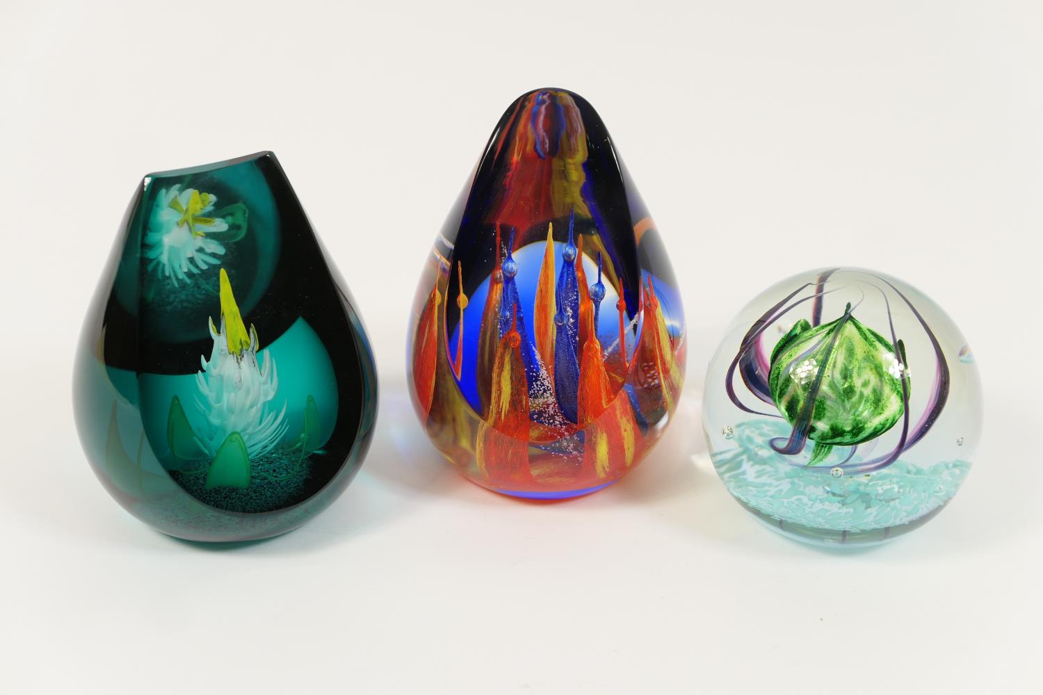 Three Caithness limited edition glass paperweights, comprising The Lost World, numbered 314/350,