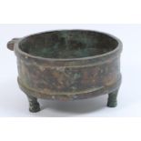 Ancient bronze censer, probably Arabian Peninsula, circular form raised on three hoof feet,