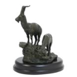 Bronze animalier group, cast as ibex on rocks, limited edition and numbered 82/100, mounted on an