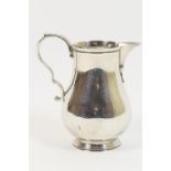 George V silver baluster milk jug, by Goldsmiths & Silversmiths Company, London 1919, plain baluster