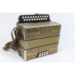 Hohner gilt decorated piano accordion, width 28cm