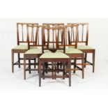 Set of six Regency mahogany dining chairs, circa 1810-20, each with stiff leaf carved stick backs,