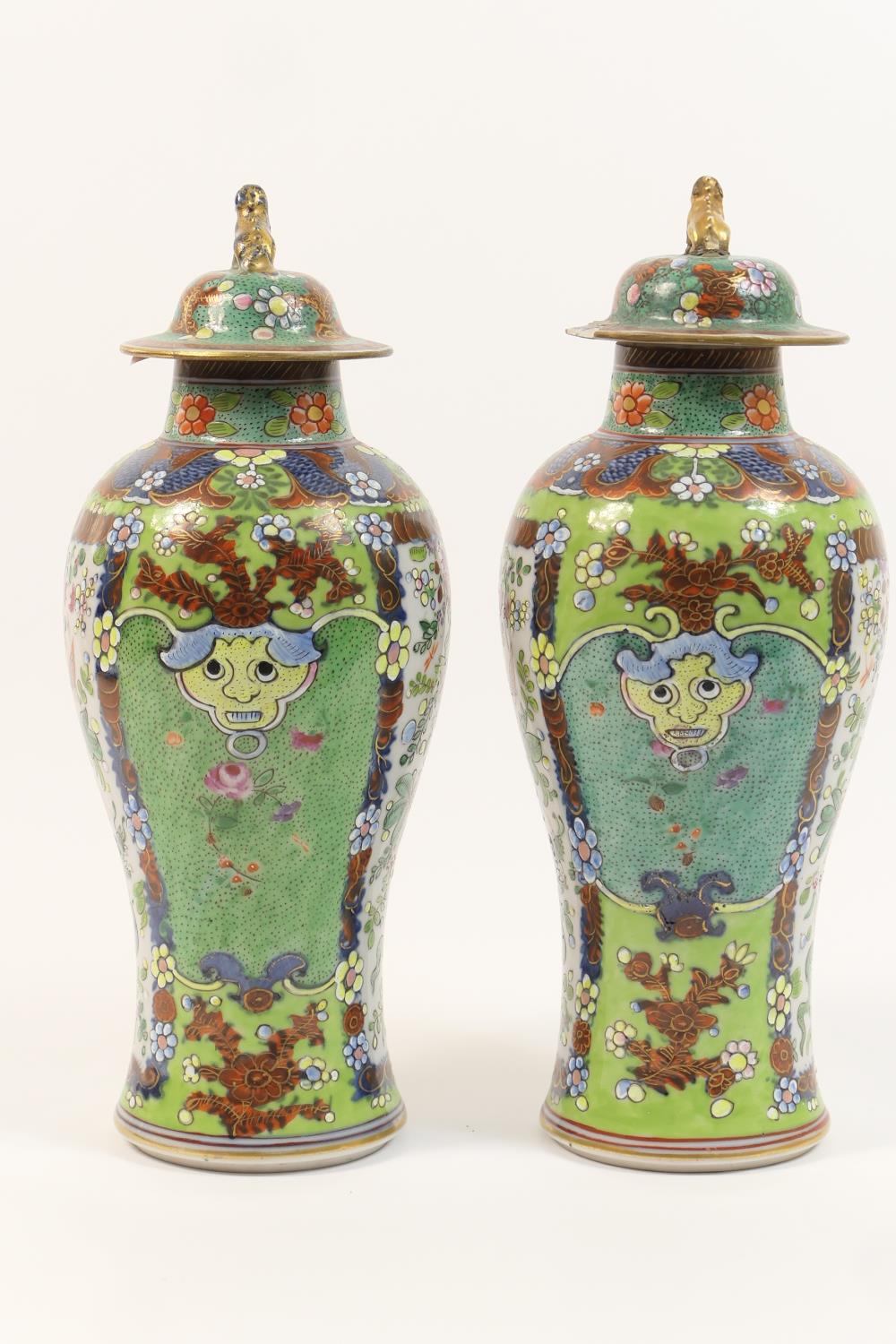 Pair of Chinese 'clobbered' export vases, early 19th Century with later decoration, each with a - Image 2 of 18