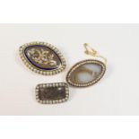 Three 19th Century memorial brooches, comprising an elliptical brooch centred with a seed pearl