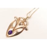 9ct gold and amethyst pendant necklace, the openwork pendant in Art Nouveau style centred with an