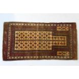 Turkmen woollen prayer rug, fawn field with a multi guardstripe madder border, size approx. 191cm