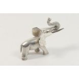 Modern silver elephant desk ornament, London import marks, 6.5cm, weight approx. 93g (2.99 troy ozs)