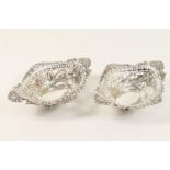Pair of late Victorian silver bonbon dishes, Chester 1897/8, of pierced boat shape, raised on four