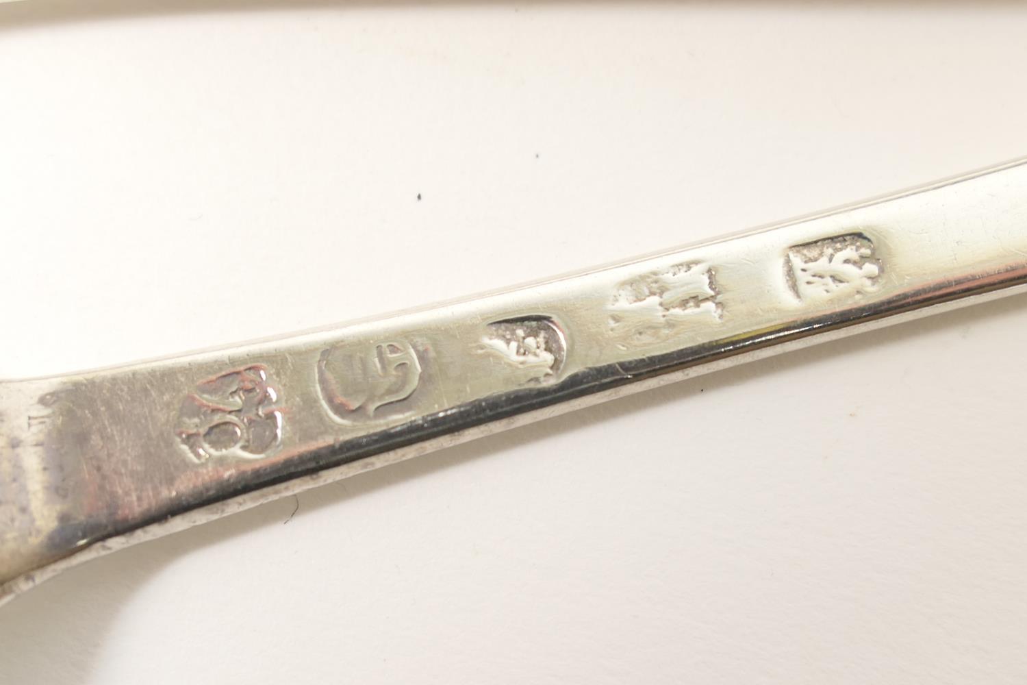 Pair of George III silver tablespoons, maker B.C., London 1766, also a Queen Anne silver rat tail - Image 2 of 3