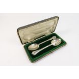 Pair of George V Britannia silver rat tail spoons, by Thomas Bradbury & Sons, London 1910, trefid