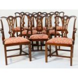 Set of eight mahogany dining chairs in the Chippendale style, comprising two carvers and six