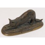 Bronze sculpture of an outstretched cat, bears a signature, 23cm