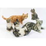 Six Wynstanley pottery cats including a ginger prowler, 20cm; the smallest 10cm high