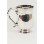 James Dixon & Sons silver pint tankard, Sheffield 1977, plain baluster form, uninscribed, over a