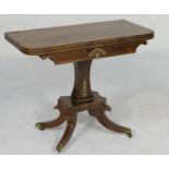 Regency rosewood and brass inlaid folding pedestal card table, circa 1820, the top inlaid with brass