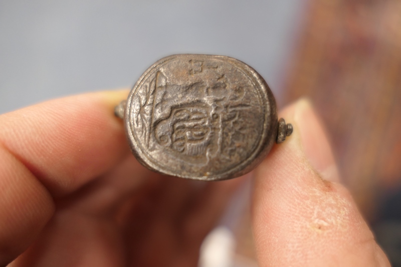 Wrought metal swivelling seal fob, late 17th or early 18th Century, having three seals fixed by a - Image 2 of 6