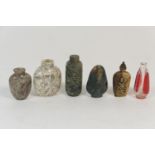 Six Chinese snuff bottles, four being in hardstone, the largest of cylinder form, 8cm; the other two