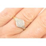 Diamond cluster ring, set with seven small round brilliant cut diamonds in a hexagonal millegrain