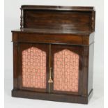 Regency rosewood chiffonier, having a recessed panel back with a single shelf and three-quarter