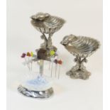 Pair of Victorian electroplated scalloped dishes, circa 1880, the dishes supported on three dolphins