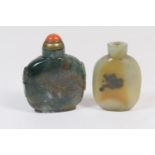 Chinese blue moss agate snuff bottle, carved with lion's mask and ring handles (repaired), 7cm; also