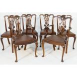 Set of six mahogany dining chairs, in the Chippendale style, comprising two carvers and four