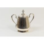 Russian silver sucrier, circa 1908-26, plain twin handled tapered form with hinged cover and finial,
