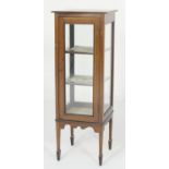 Edwardian mahogany and inlaid pillar display cabinet, circa 1900, glazed on all four sides and