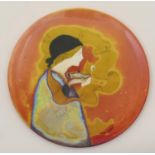 Rare Bernard Moore plate, circa 1905-15, decorated with a girl holding a lamp, in flambe, black,