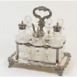 Victorian electroplated seven bottle cruet, circa 1860-80, the rectangular base with central