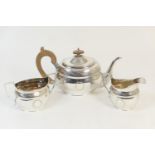 Modern silver three piece tea service, by Roberts & Belk, Sheffield 1979, in Georgian style,