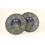 Pair of Japanese cloisonne plaques, late Meiji (1868-1912), worked with iris and other flowers to