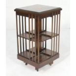 Quality reproduction mahogany and inlaid revolving bookstand, square form with satinwood and boxwood