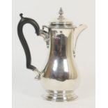 George V silver hot water jug, London 1935 Jubilee mark, plain baluster form with hinged cover and