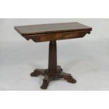 George IV rosewood folding pedestal tea table, the swivelling folding top over a frieze with