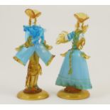 Pair of Murano glass figures, typically worked in elaborate costumes in blue and amber glass,