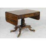 George IV rosewood pedestal sofa table, circa 1825-35, the top with two drop leaves, beaded recessed